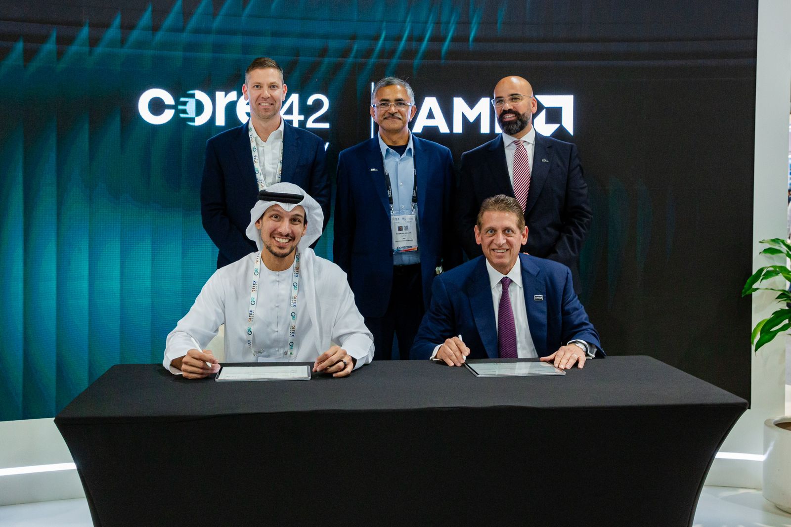 Talal Al Kaissi, EVP - Chief Partnerships Officer and Government Affairs, Core42 and Phil Guido, EVP and Chief Commercial Officer, AMD at the MoU signing at GITEX Global